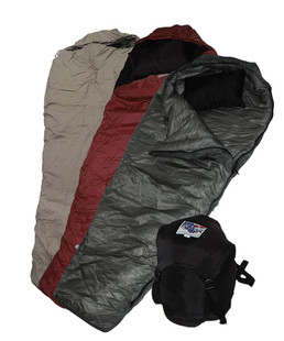 Wiggy's coyote brown, burgundy, and dark gray super light sleeping bags stacked atop one another and fanned out on a white background to make each color visible with a black stuff sack to the side.