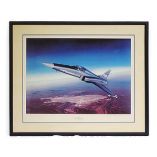 Lithograph of Northrop F-20 Tigershark jet flying high above an arid landscape with strikingly blue sky
