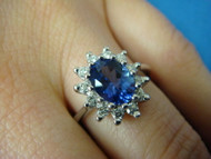 1.30 CT T.W. TANZANITE AND HALO DIAMONDS ROYAL ENGAGEMENT RING