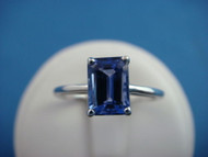 1.18 CARAT TANZANITE EMERALD CUT IN PLAIN SCROLL FILIGREE SETTING RING