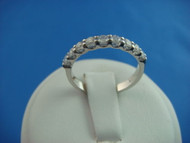 LADIES DIAMOND WEDDING BAND SHARED PRONGS 0.50 CT T.W. DOMED SETTING