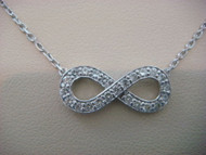 "INFINITY" DIAMOND DESIGNER NECKLACE 0.33 CT T.W. 16 INCHES.
