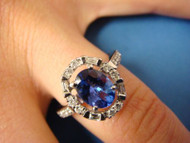 14k White Gold Genuine Tanzanite and "Halo" Diamonds Designer Ring