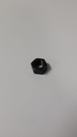 63 100 03-S } NUT: EXHAUST
