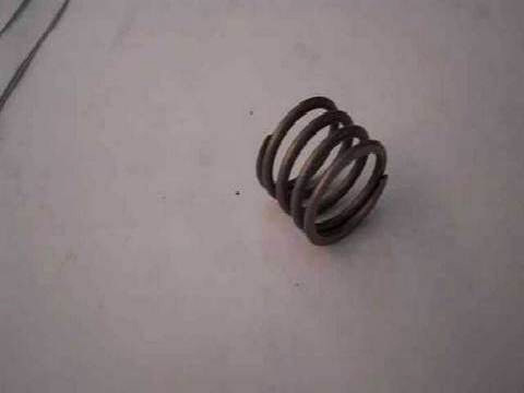 ED0057250320-S } SPRING