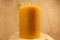 3x4 solid  ppbeeswax pillar with honeycomb pattern.