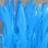 Hareline Dyed Over White Strung Saddle Hackle (Kingfisher Blue)