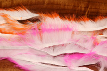 Hareline Two Toned Crosscut Rabbit Strips 1/8" (Top- Hot Orange Tipped White; Bottom- Hot Pink Tipped White)