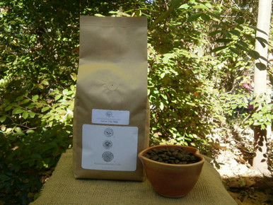 100% Jamaica Blue Mountain Coffee in 2 lb. biotre bag, with beans shown on lower right.
