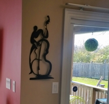 12 x 21 inch Black 16 gauge steel , powder coated that will not rust, great for indoor or outdoor decor.