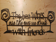 32 x 14 inch Black powder coated 16 gauge steel and will not rust . Great for indoor or outdoor decor.