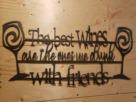 32 x 14 inch Black powder coated 16 gauge steel and will not rust . Great for indoor or outdoor decor.