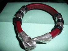 Burgundy leather bracelet, antique silver serpent head clasp, and bands, with rhinestones,  black accent bands. 6.5 inches