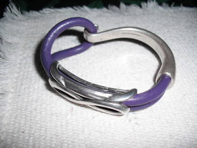 Purple leather double bracelet. Antique silver accents and hook clasp. 5 inches
