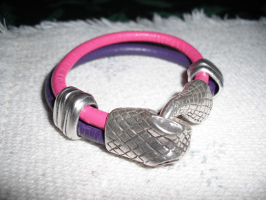 Hot pink and purple leather double strand bracelet. Antique silver accents and serpent head clasp. 5.5 inches