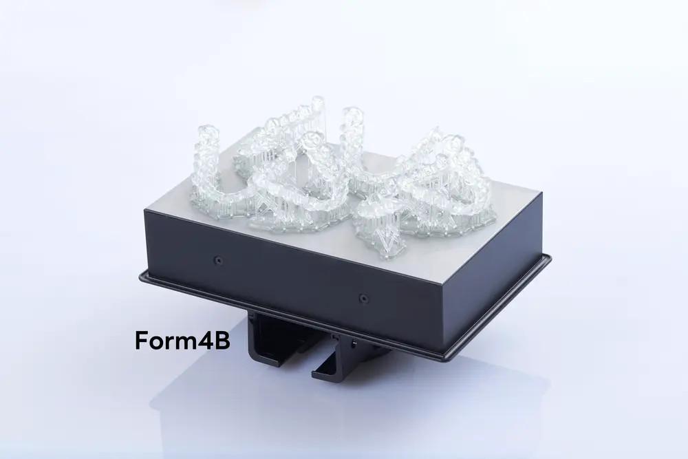 Multiple trays printed on Form4B printer, demonstrating stable support performance