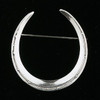 A classic sterling silver horseshoe pin from a circa 1930 mold. 1 5/16" wide x 1 1/2" tall.