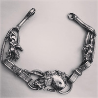 Silver Metal Horses and Accessories Bracelet