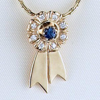 14k Gold Ribbon Pendant with Diamonds and Sapphire