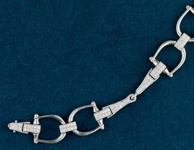 14k white gold bit bracelet with 3.5ctw diamonds. Totally moveable bit parts make this an amazingly comfortable piece. Stunning and unique with hidden clasp and safeties.