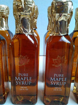 Pure New Hampshire Maple Syrup in a Tall Glass Bottle