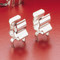 122083 Circuit Board Mount Traditional Fuse Clip with Ear Stops for 3AG - 1/4" Diameter Fuses, <=30 Amp, <=250V, Beryllium Copper with Tin Plating.