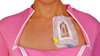 Pink chemotherapy shirt with port access open on two sides