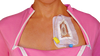 Pink chemotherapy shirt with port access open on two sides