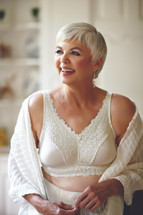 American Breast Care Embrace Mastectomy Bra in black, candle light, and soft mocha