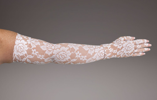 LympheDivas 20-30mmHg or 30-40mmHg medical compression in tan background with white lace pattern called Darling Tan.