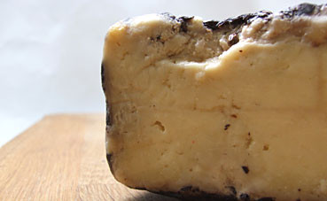 testun al barolo, this is a cheese has been natured with nebbiolo grape pressing