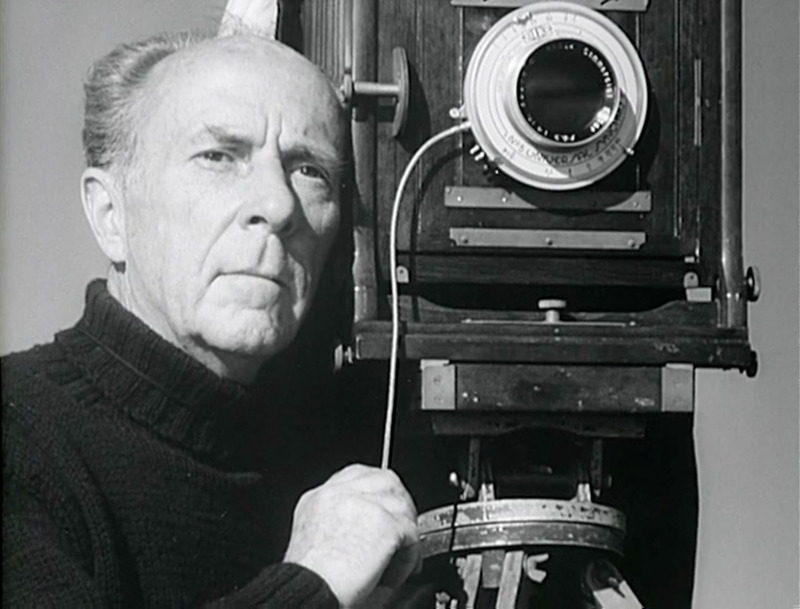 Edward Weston taking a photograph with a 14 Inch f/6.3 Kodak Commercial Ektar Lens in 'The Photographer,' Willard Van Dyke's 1948 documentary film.