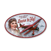 Learn to Fly Oval Metal Sign
