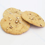 Round sweet mathi crackers with sugar coating