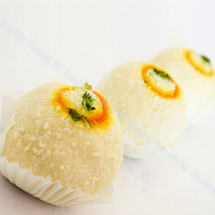 Kadam keer rasgulla coated with grated khoya