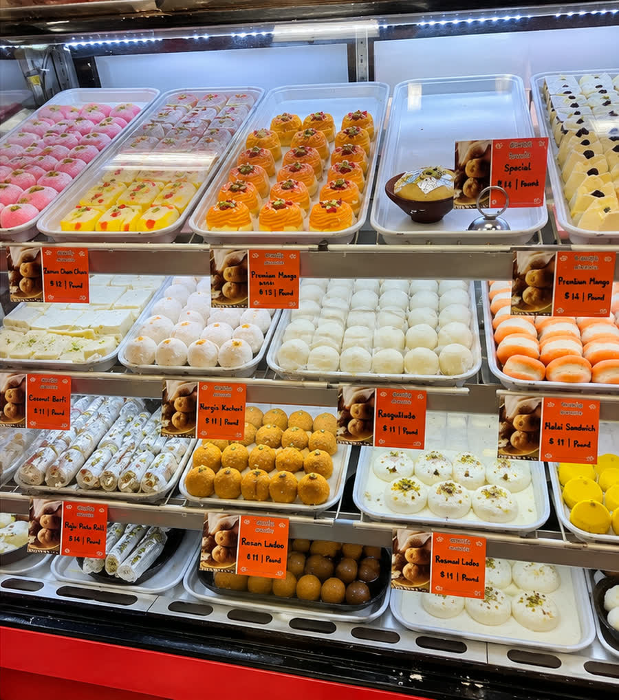 Fresh Indian mithai display counter at Quality Sweets in Iselin, NJ