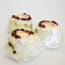 Manpasand layered cashew and pistachio diamond sweets