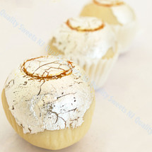 Malai peda milk sweets topped with pistachios