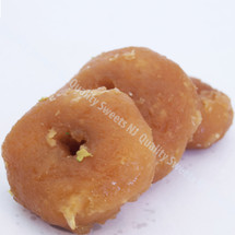 Balushahi flaky pastry rounds glazed in sugar syrup
