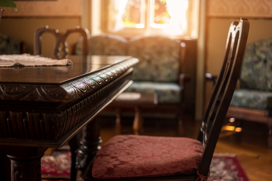 Antique table and chair. Classic room interior