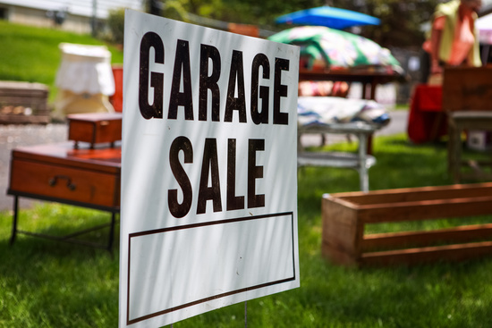 garage sale sign in yard