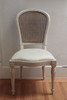 Louis XVI Chair with antique caning and cream painted finish