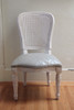 Louis XVI Cane Chair in white painted finish with silver upholstery
