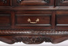 Detail of bottom carvings on china cabinet