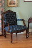 Upholstered in royal Batavia blue and gold bee pattern jacquard