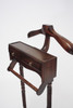 Antique valet stand showing the solid wood coat hanger, clothes hanger, and jewelry drawers