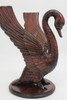 Wooden carving of trumpeter swan