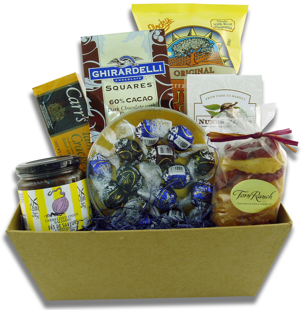 Gift basket arrangement filled with chocolates, crackers, and dips