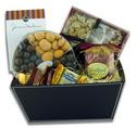 Gift basket arrangement filled with a variety of chocolates and nuts