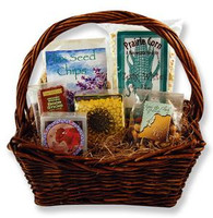 Gift basket with prairie corn, flax chips, jerky, beef sticks, candy sunflower seeds, trail mix, and glacial rocks